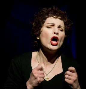 Naomi Emmerson as Edith Piaf in Piaf: Love Conquers All. Photo by Larry Auerbach.