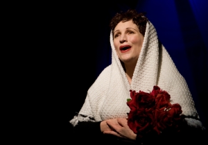 Naomi Emmerson as Edith Piaf in Piaf: Love Conquers All.  Photo by Larry Auerbach.